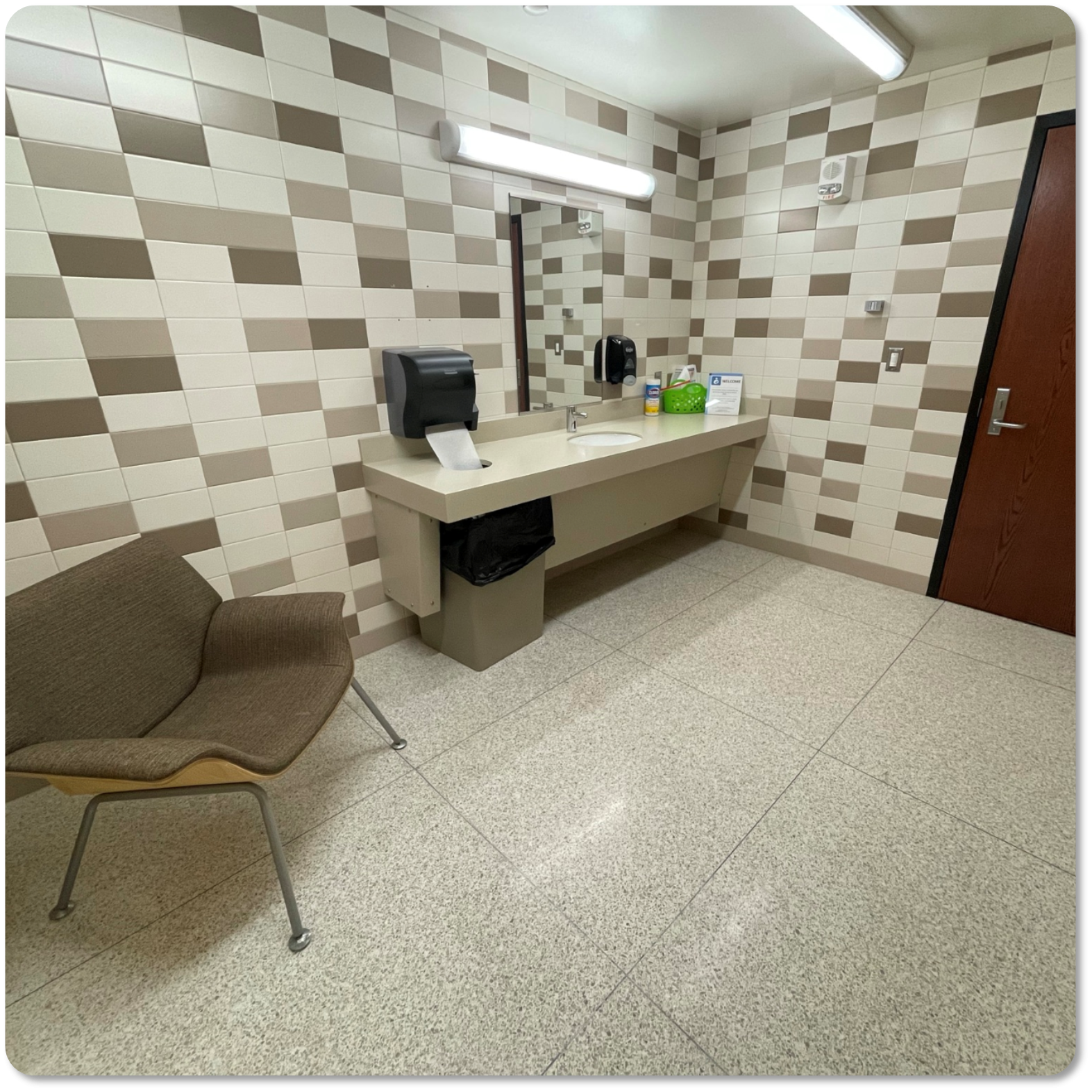 Picture of chair and sink in room