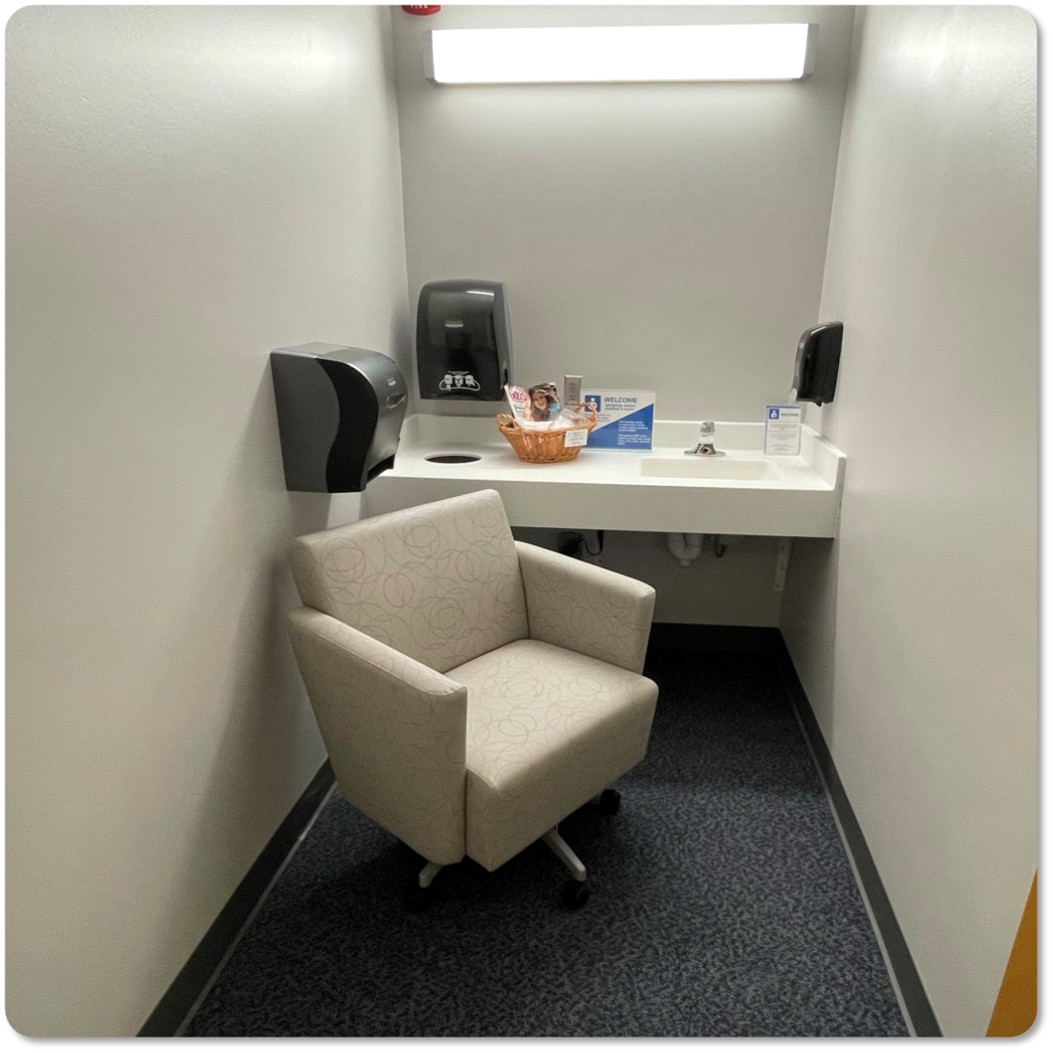 Chair with desk and sink