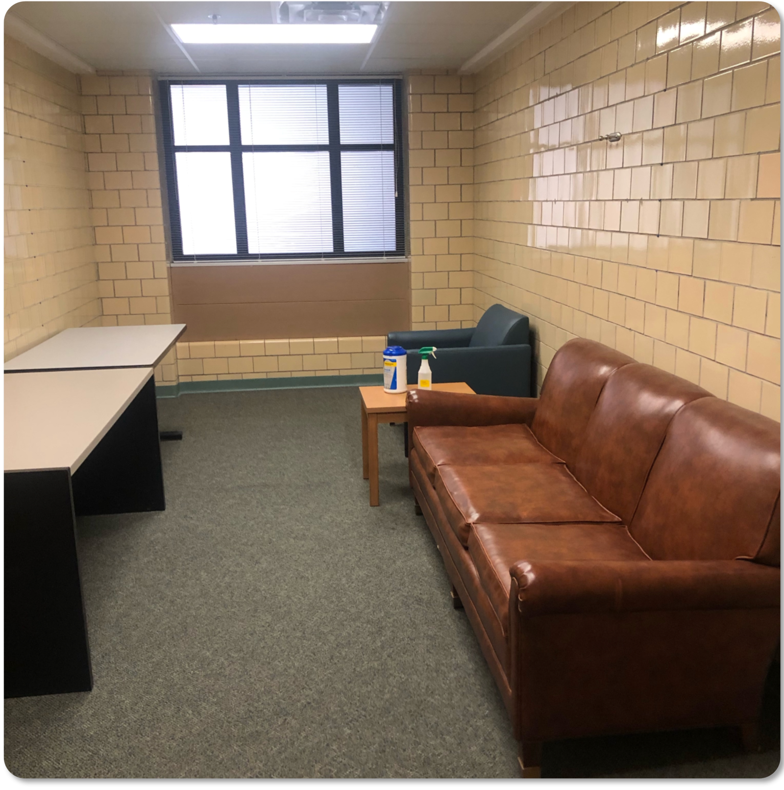 Couch and desks in room
