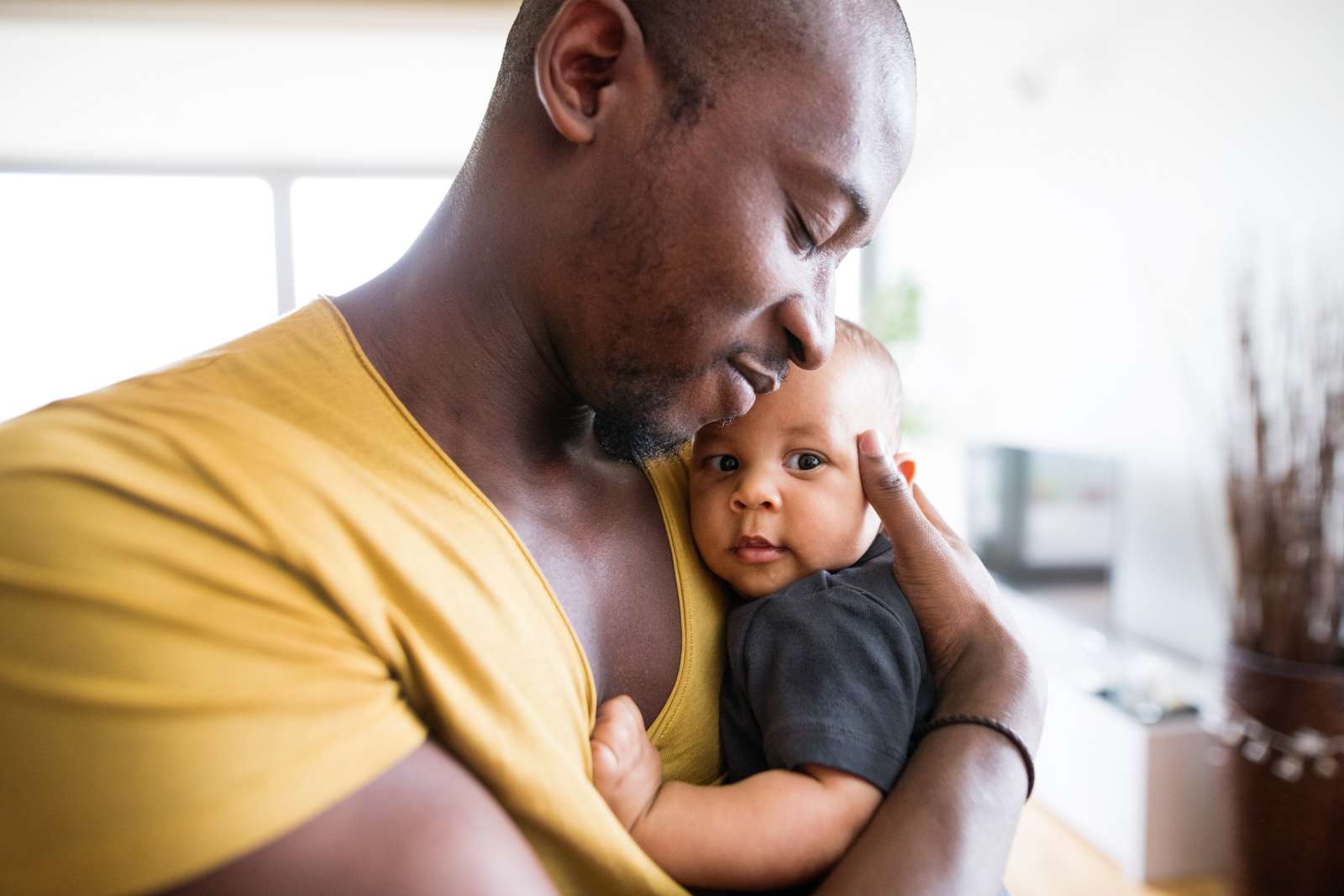 Young father holding a child